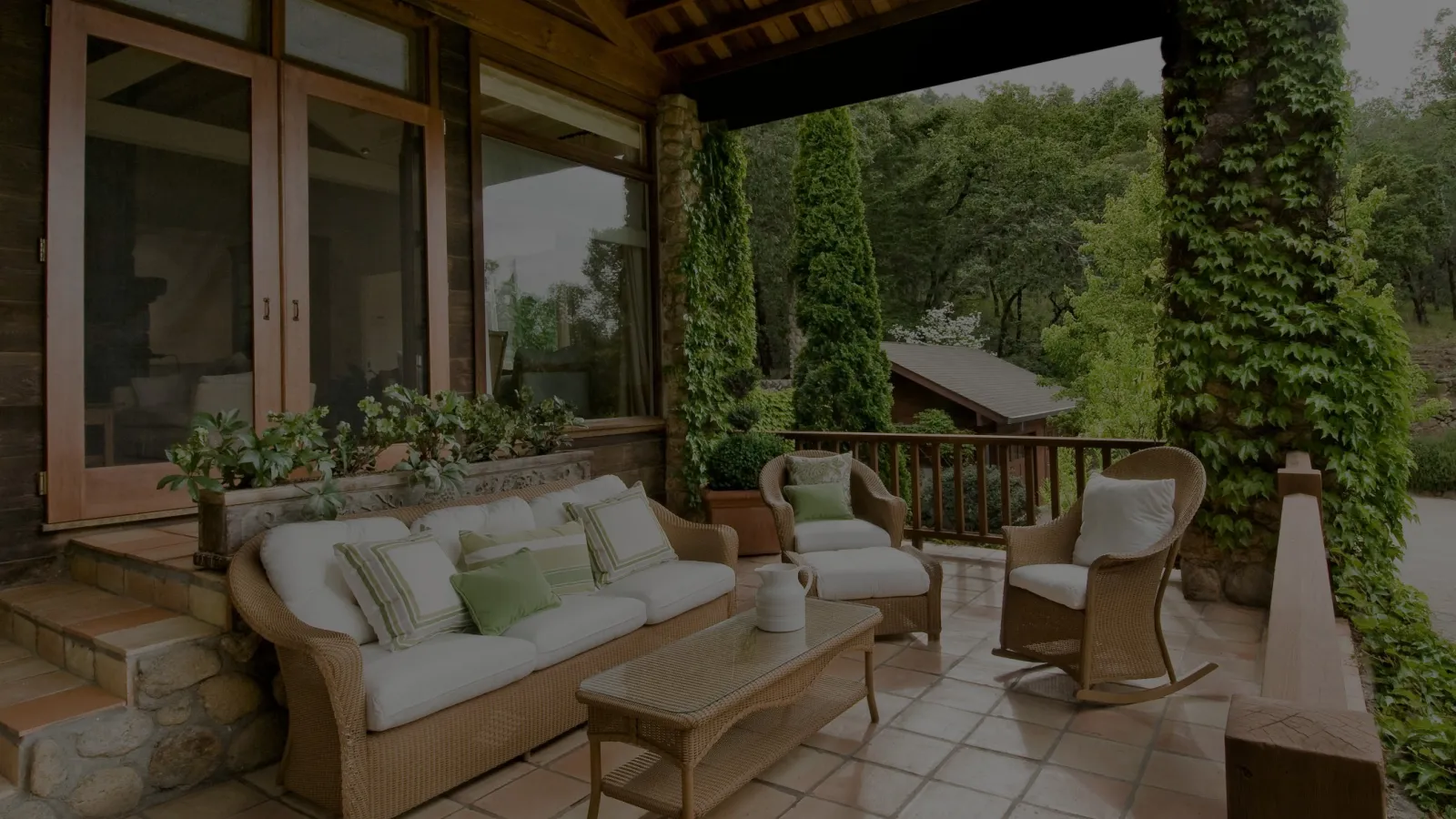 a living room with a patio and a table