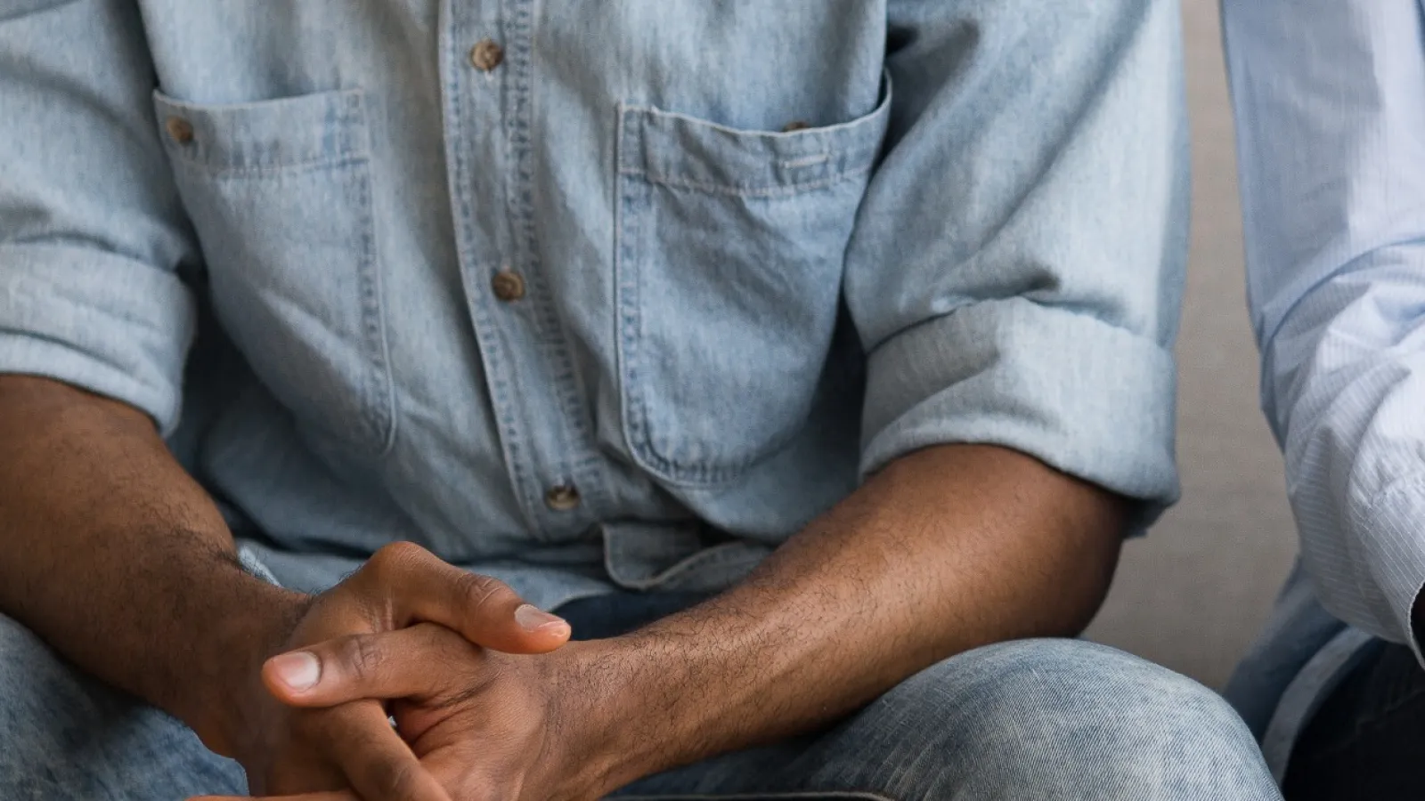 a man sitting on a couch