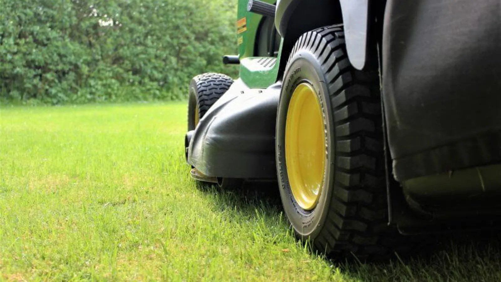 Mowing grass riding mower