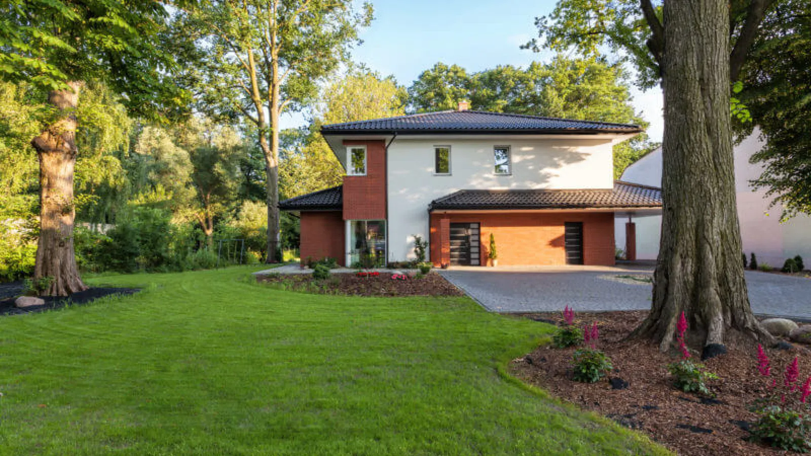 Green Grass with spanish looking house