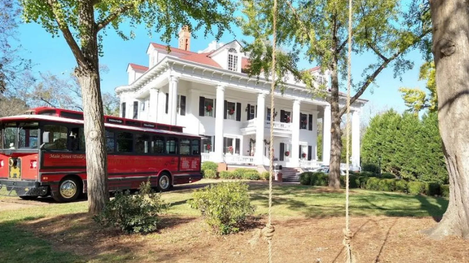 white building with trolly