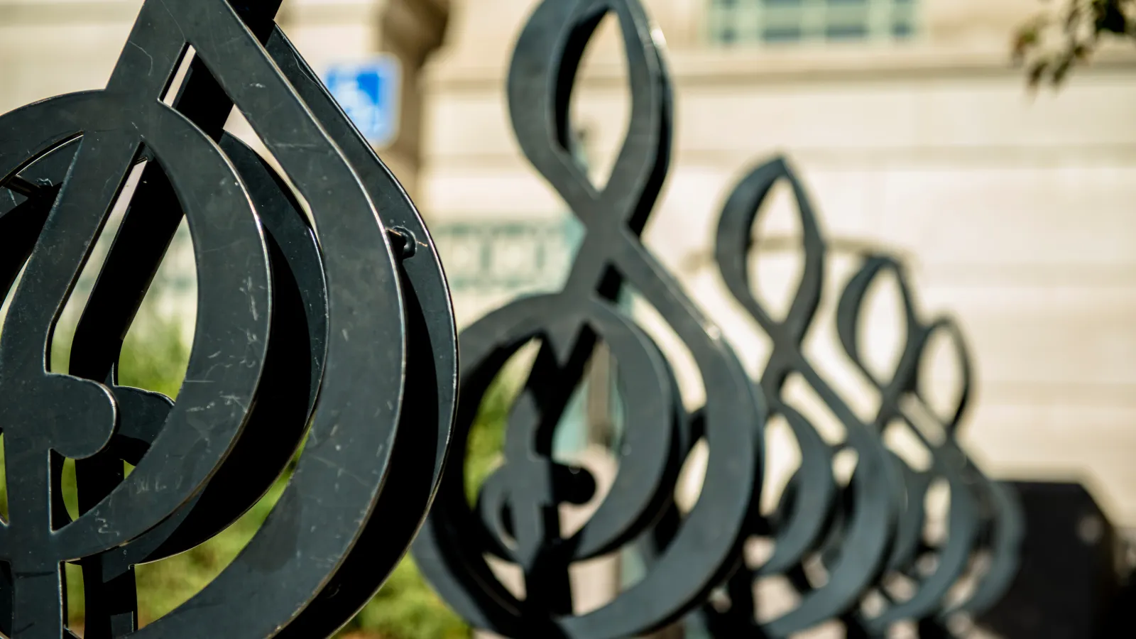 a metal gate with music symbol on it