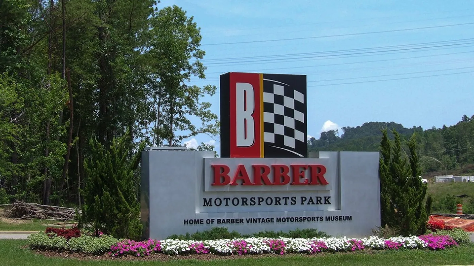 Barber Motorsports Park sign surrounded by pretty grass and plants