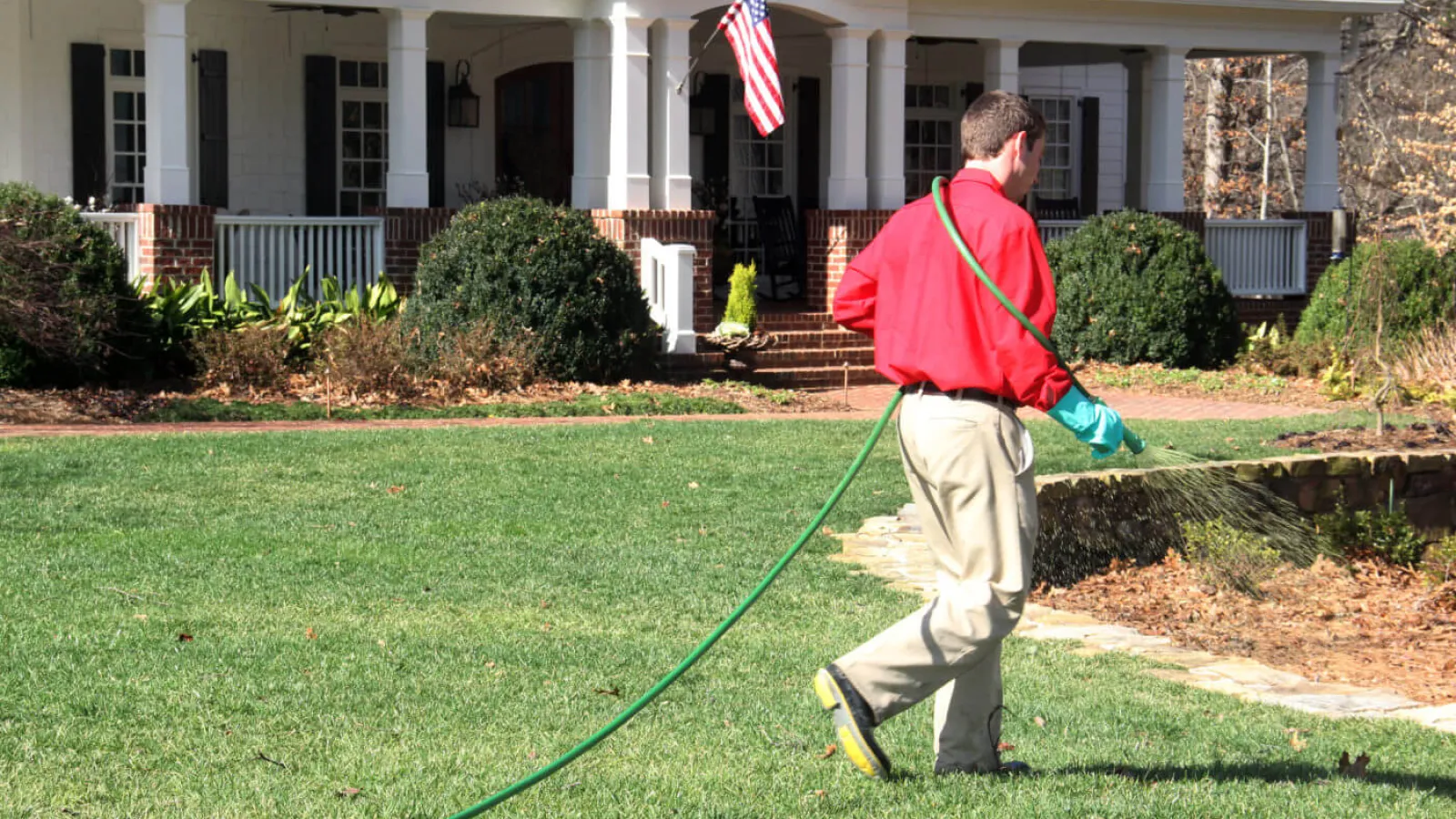 a man holding a golf club