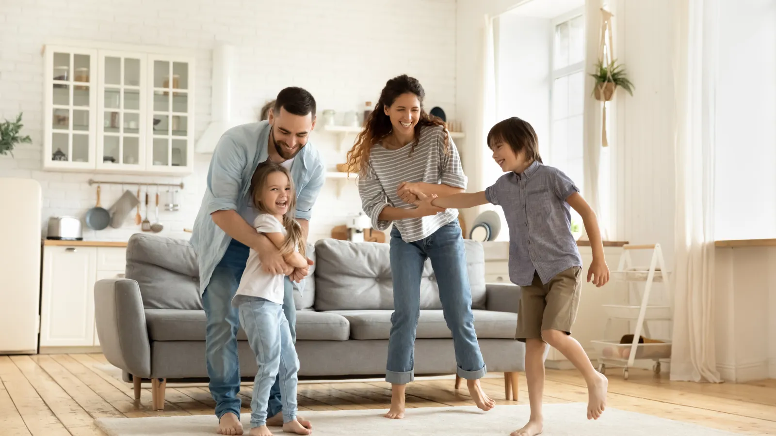 a group of people standing on a couch