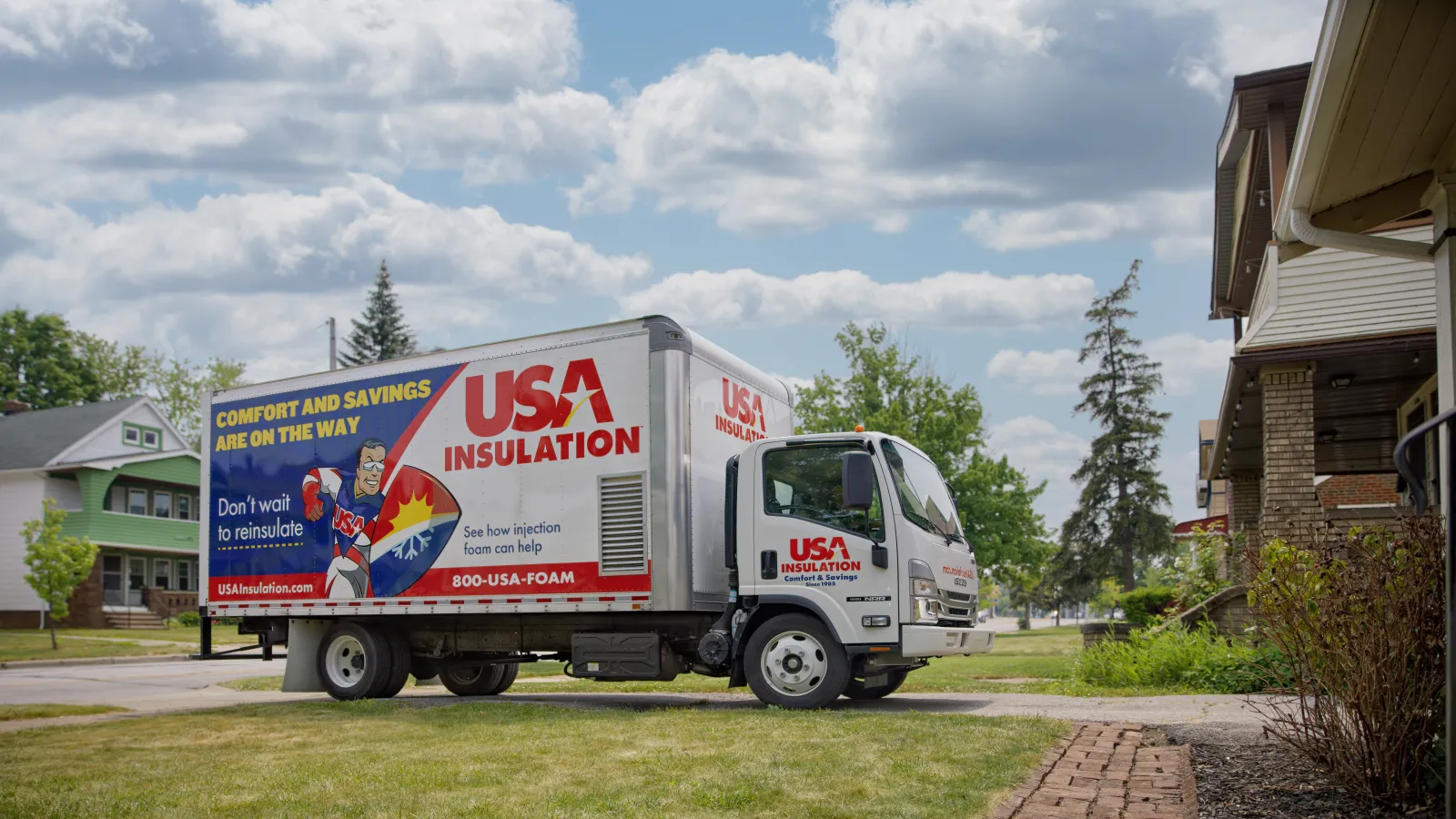 a white truck parked on a driveway