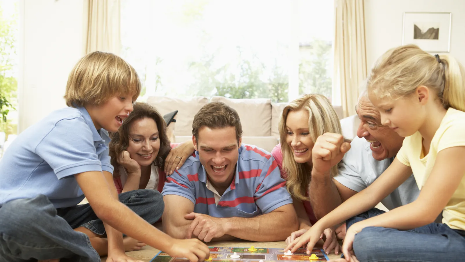 a group of people playing a board game