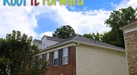 Two-story house with a new roof under a partly cloudy blue sky and a Roof It Forward graphic at the top.