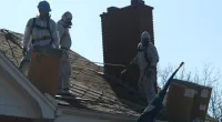 Men on a roof 