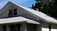 a house with new shingles