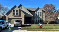 a house with a car parked in front of it