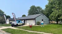 a car parked in front of a house