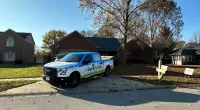 a truck parked in a driveway