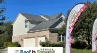 a house with a sign in front