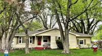 a large lawn in front of a house