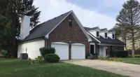 a home with an Owens Corning roofing system