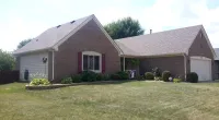 a home with an Owens Corning roofing system