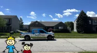 a truck parked in front of a house