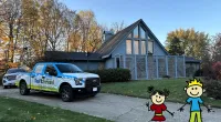 a truck parked in front of a house
