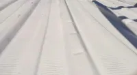 a close up of a snow covered road
