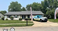 a car parked in front of a house