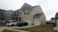 a home with an Owens Corning roofing system