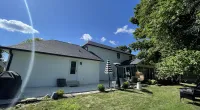 a house with a yard and a swimming pool