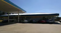 The front view of a gas station