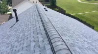 a closeup of Duration shingles on a roof