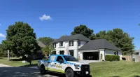 a car parked in front of a house