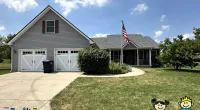a house with a flag on the front