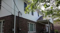 a house with Mastic Ovation Siding