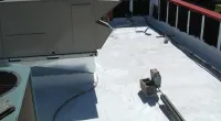 a bench in the snow