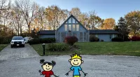 a couple of toys in front of a house