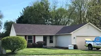 a house with new shingles