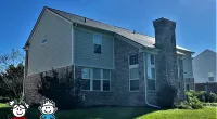 a house with a toy in front of it