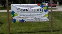 The Sanctuary Church sign