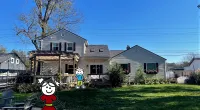 a house with a yard and lawn