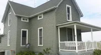 a house with Mastic Ovation Siding