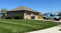 a police car parked in front of a house
