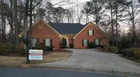 Brick house after roof replacement