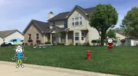 a fire hydrant in front of a house