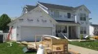 The air infiltration is kept at a minimum with a good quality house wrap.