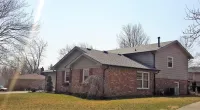 a home with an Owens Corning Duration roofing system