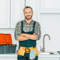 a man standing in a kitchen