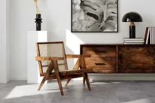 Thumbnail for Modern living room with wooden armchair, sideboard, black lamp, abstract leaf wall art, and decorative golden feather.