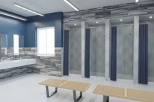 Thumbnail for Modern locker room with blue and gray tile walls, wooden benches, sinks, mirrors, and shower stalls with navy curtains.