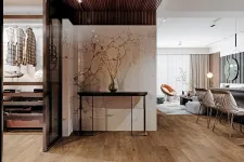 Thumbnail for Modern open-plan living space with wooden floors, marble wall, stylish furniture, and walk-in closet.