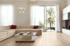 Thumbnail for Modern living room with beige sectional sofa, wooden floor, white coffee table, large windows, and chandelier lighting
