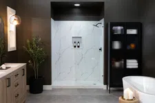 Thumbnail for Modern bathroom with freestanding tub, wooden vanity, glass shower, black cabinet, and decorative lighting.
